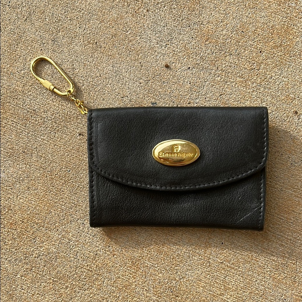 Etienne Aigner Black Wallet with Gold Accents